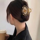 Golden-Nazariya-small-clutcher
